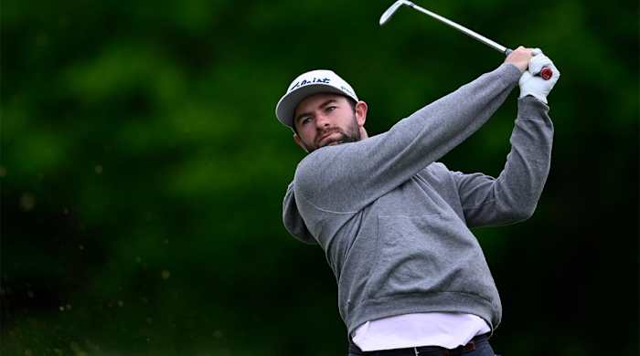 Cameron Young watches his tee shot on the third hole during the final round of the Wells Fargo Championship golf tournament, Sunday, May 8, 2022, at TPC Potomac at Avenel Farm golf club in Potomac, Md.